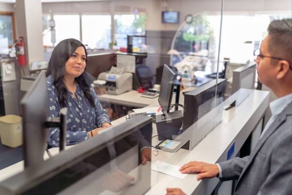 bank teller with customer