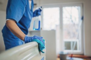 FDC employee cleaning nursing home